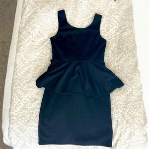 Fitted boutique black bow peplum dress